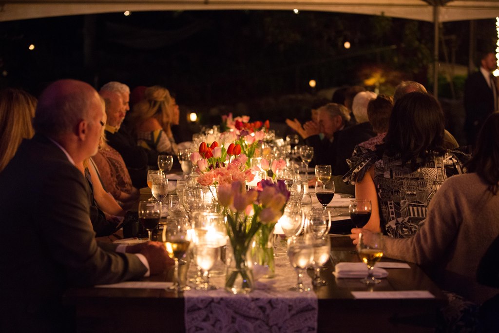 Gold Hill Gardens, Outdoor reception. Guests enjoying candle light dinner.