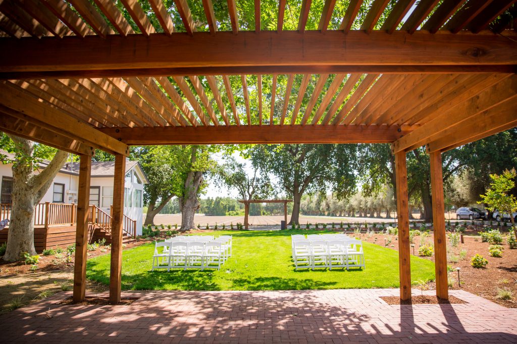 Hidden Grove, Woodland, CA, Yolo County, Ceremony under a trellis.