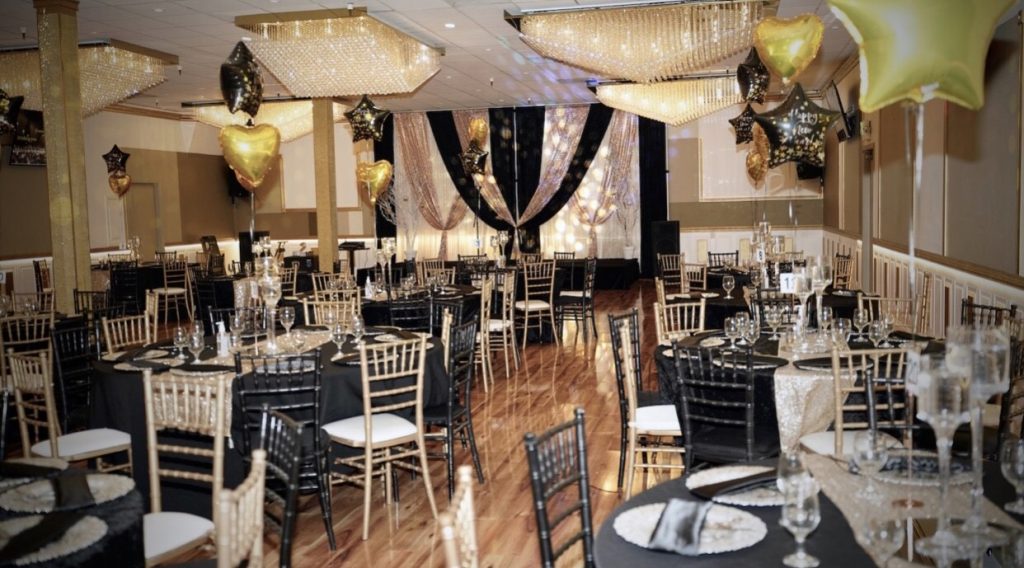 Town and Country Event Center, Sacramento, CA. Gold Hall set up for New Years Party.