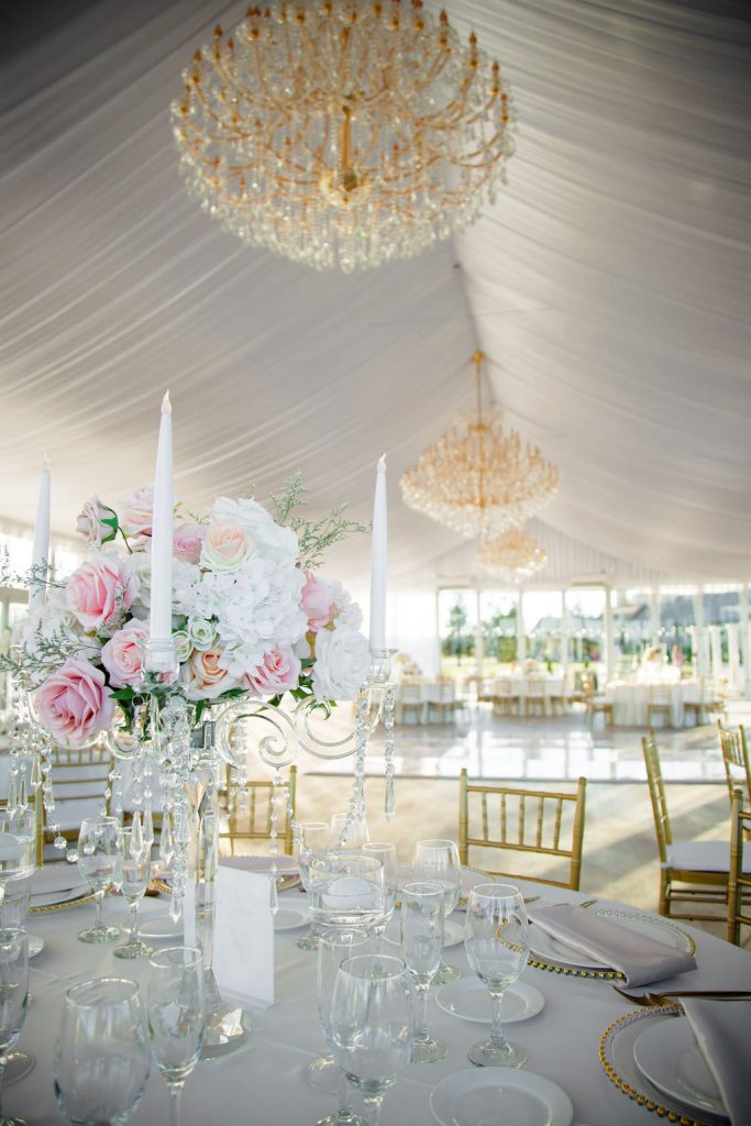 Lakeview Estates. Private Estate along a private lake. Inside the white marquee tent. Detailed table setting.