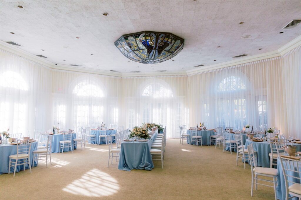 Vizcaya Sacramento, Mansion and Pavilion. Reception set up. Blue stained glass light fixture.
