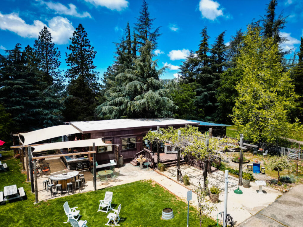 Chateau Daveall Boutique Winery. El Dorado County. Aerial of winery tasting room and patio.