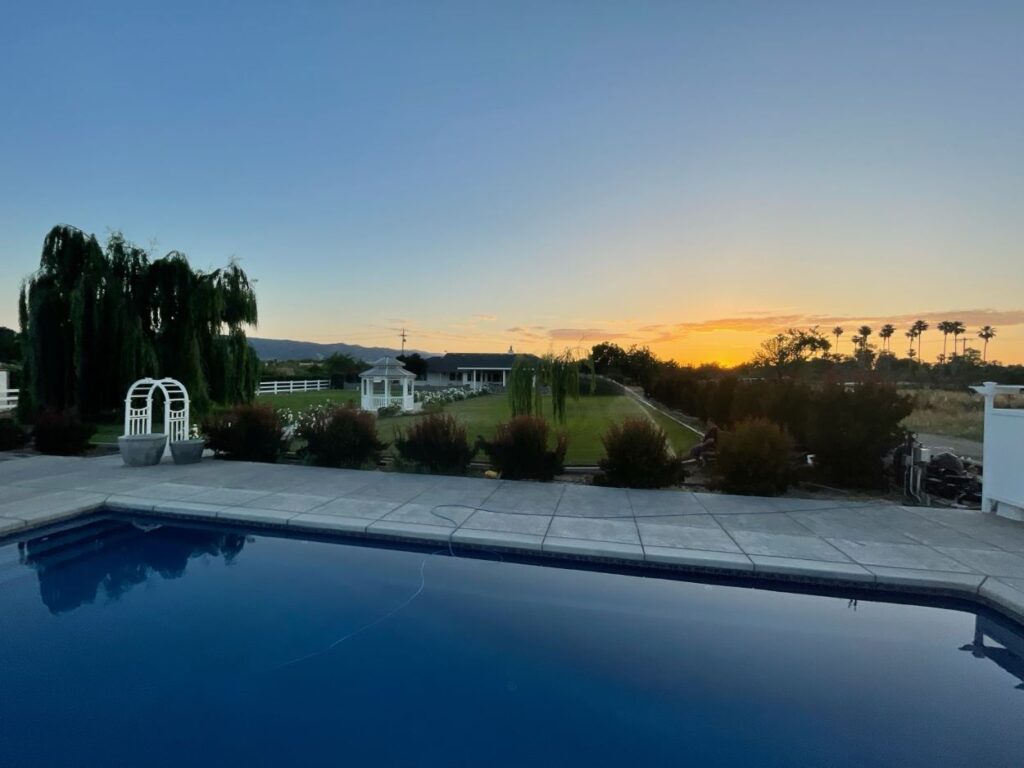 Capay Valley Ranch, Esparto, CA. Yolo County farmland. Swimming Pool with view and sunset.