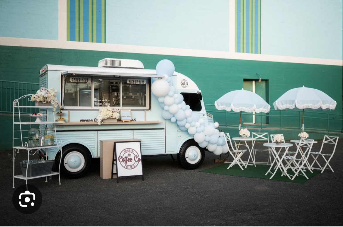 Retro Joes Coffee Company. Truck with tables set up.