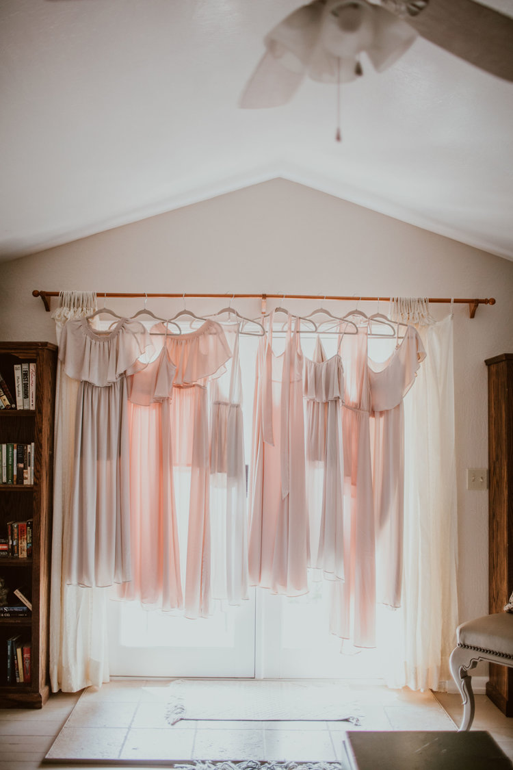 Stoney Creek Ranch, El Dorado County.  Bridesmaids dresses hanging in window.

 